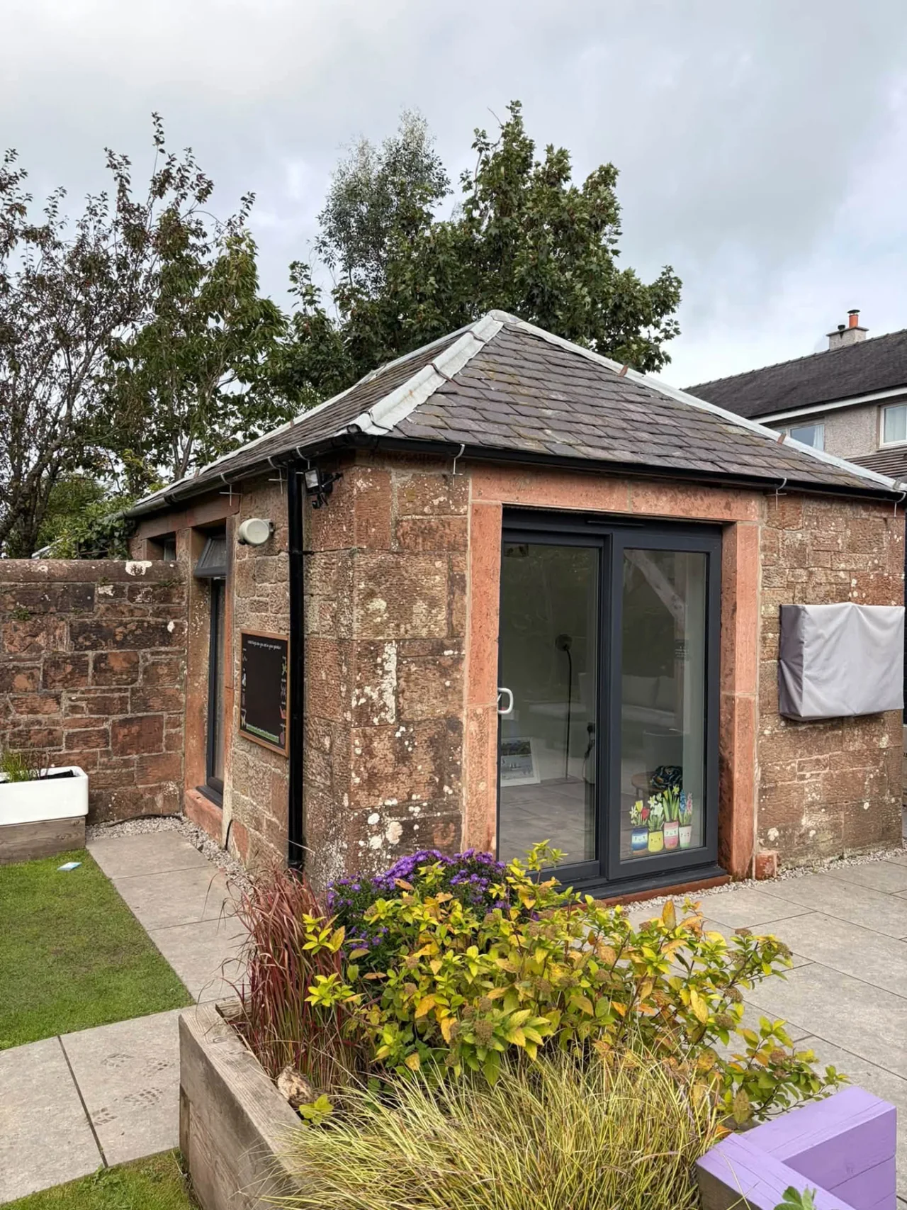 New guttering installation on a stone outbuilding